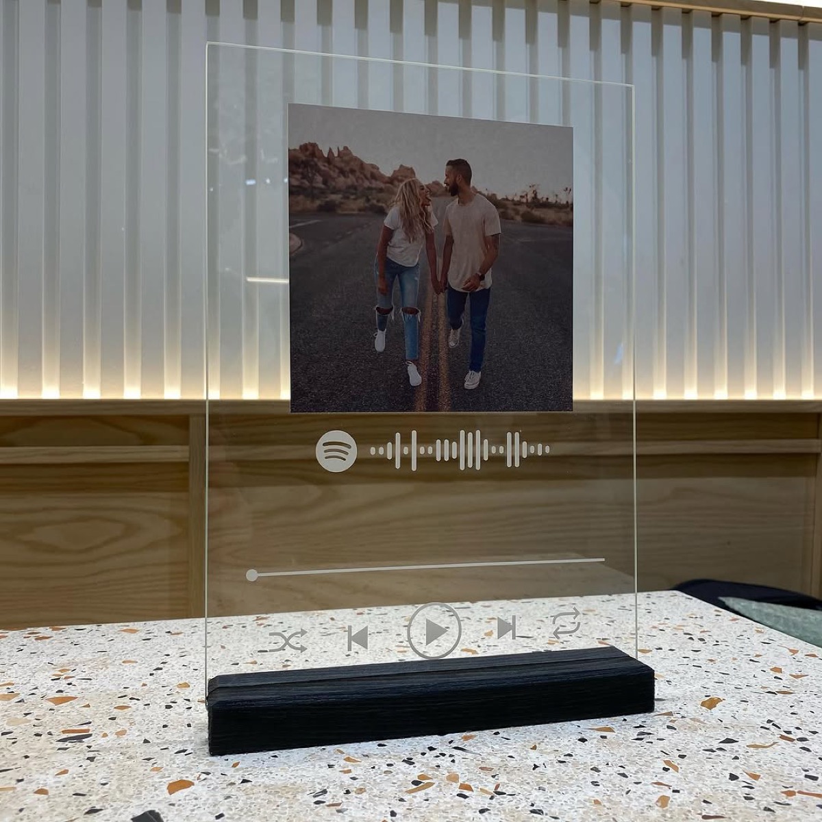 Phone scanning the keychain to start the AR video